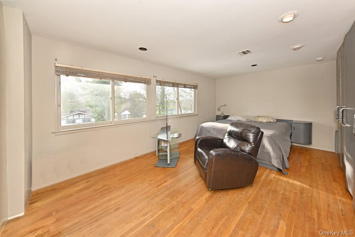 11 Lomond Avenue Chestnut Ridge, NY 10977 - Photo 19 of 26 Bedroom with light wood-type flooring
