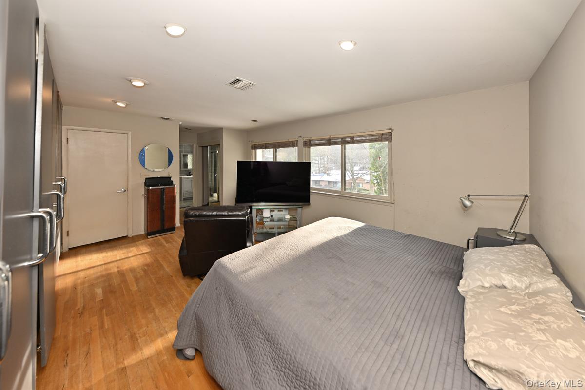 11 Lomond Avenue Chestnut Ridge, NY 10977 - Photo 20 of 26 Bedroom with light wood-style flooring and recessed lighting