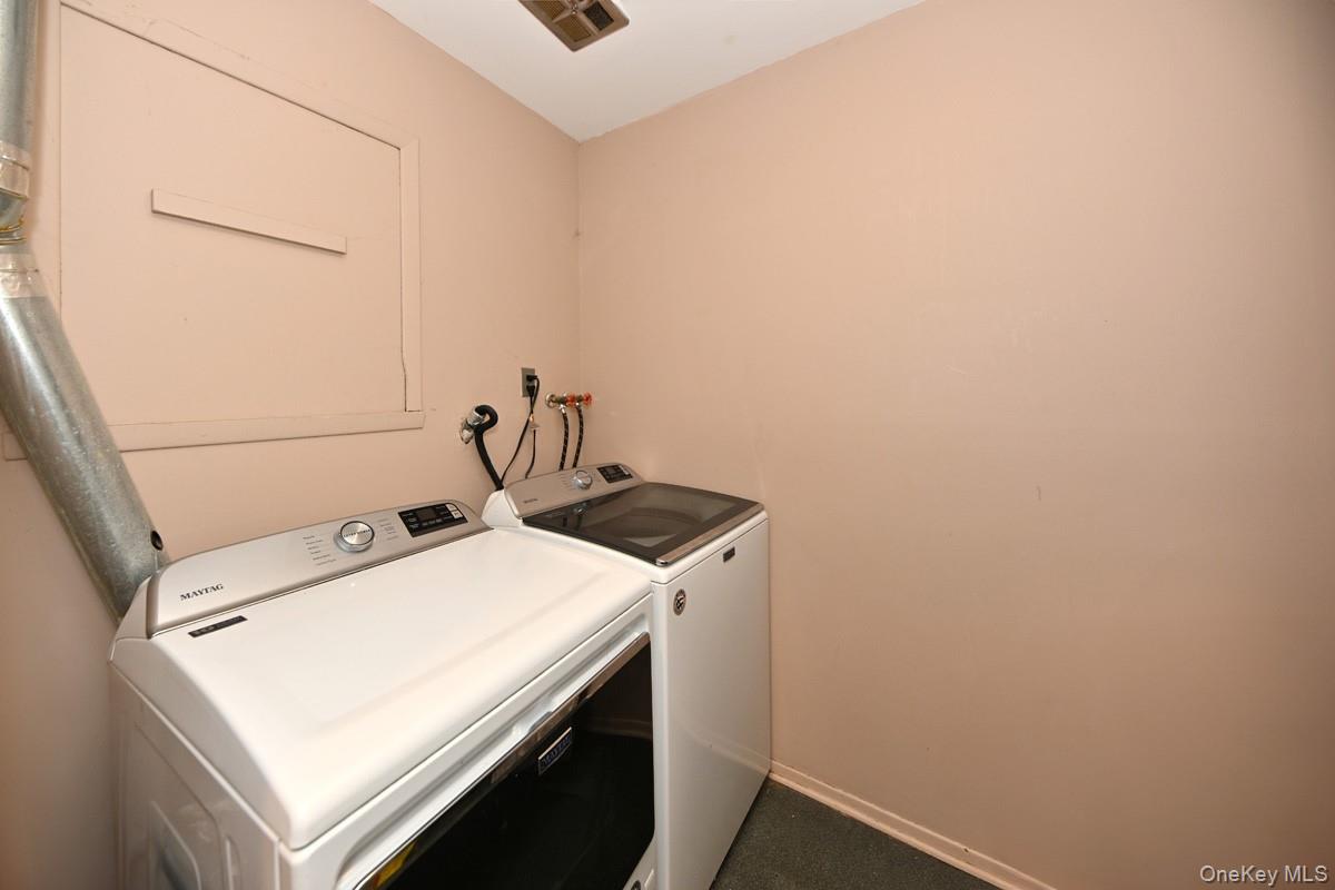 11 Lomond Avenue Chestnut Ridge, NY 10977 - Photo 21 of 26 Washroom with baseboards and independent washer and dryer