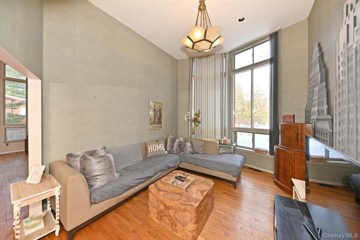 11 Lomond Avenue Chestnut Ridge, NY 10977 - Photo 5 of 26 Living room featuring wood finished floors and a high ceiling