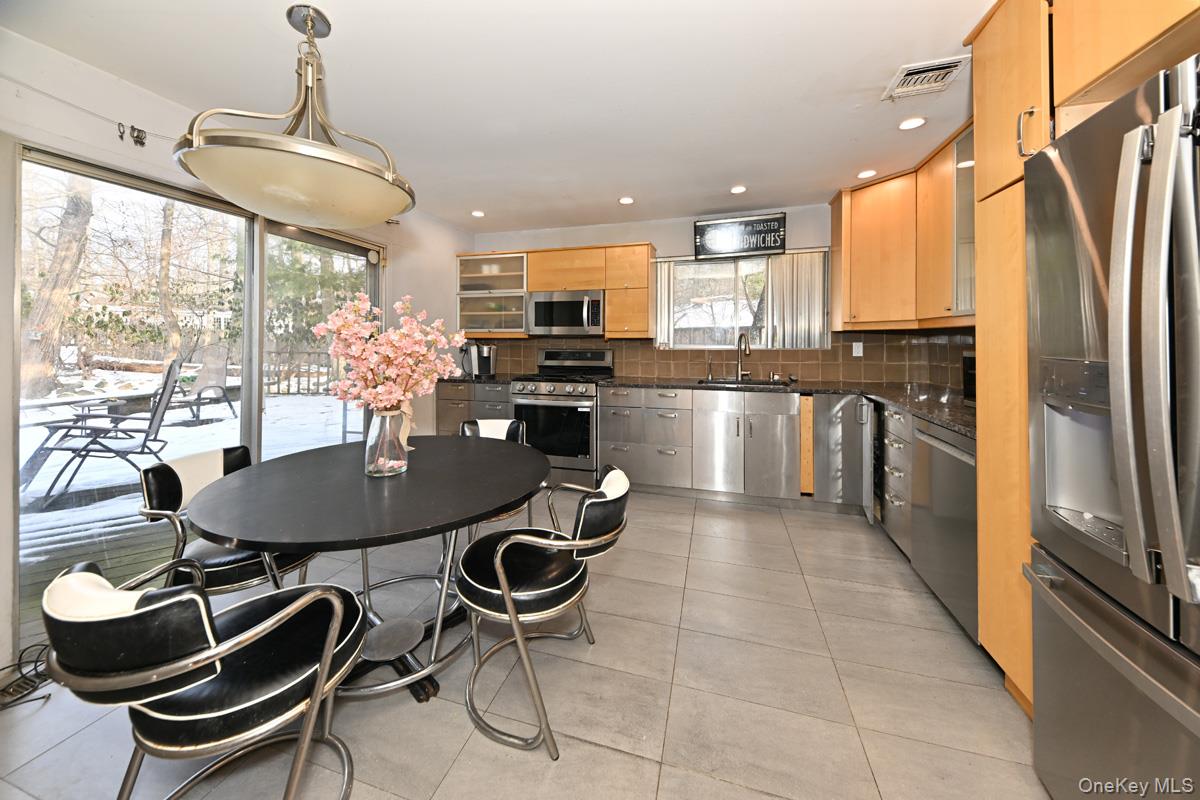 11 Lomond Avenue Chestnut Ridge, NY 10977 - Photo 8 of 26 Dining space with light tile patterned flooring and recessed lighting