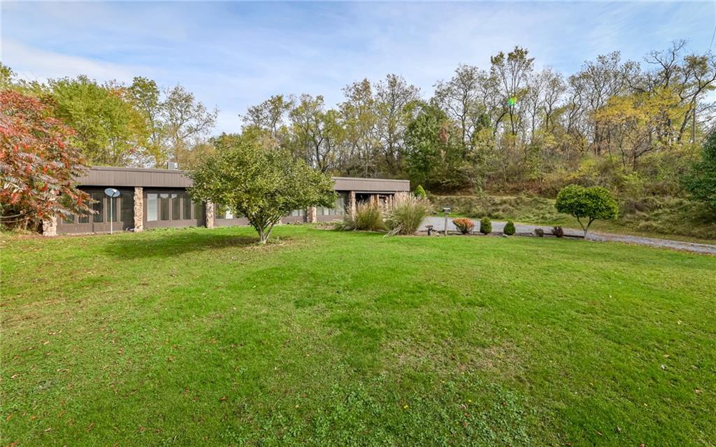 3656 Graham School Road Cranberry Township, PA 16066 - Photo 19 of 28 a front view of a house with a yard