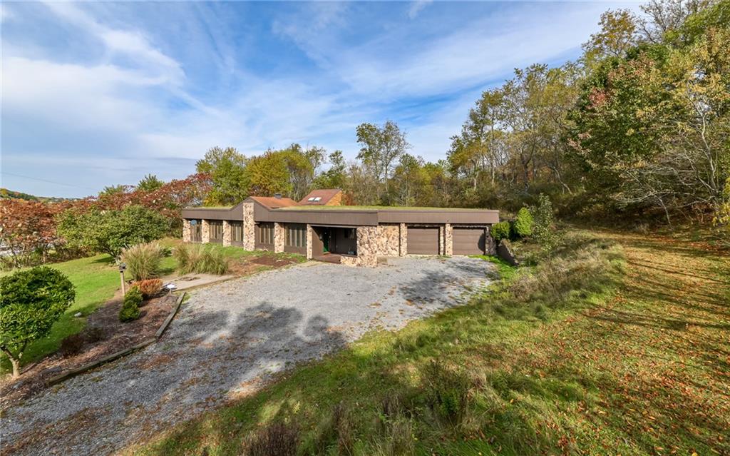 3656 Graham School Road Cranberry Township, PA 16066 - Photo 20 of 28 a view of a house with a yard