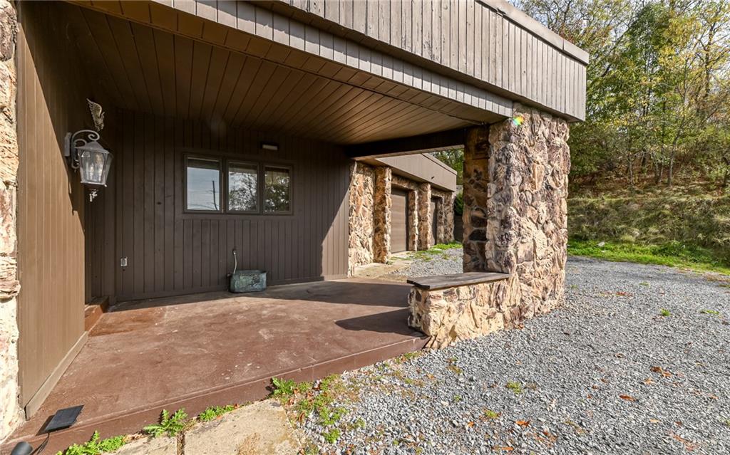 3656 Graham School Road Cranberry Township, PA 16066 - Photo 24 of 28 a front view of a house with garden