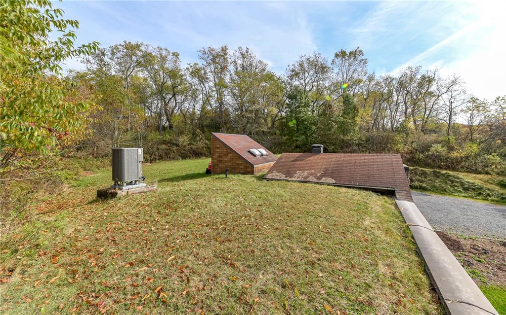 3656 Graham School Road Cranberry Township, PA 16066 - Photo 26 of 28 a backyard of a house with a yard and outdoor seating