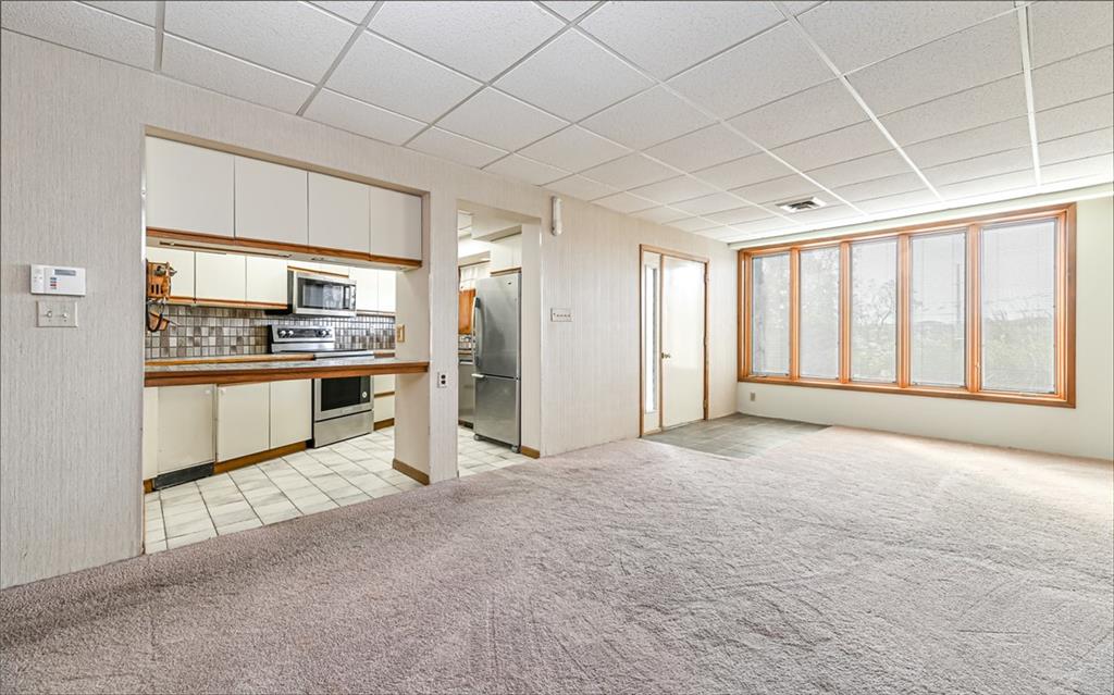 3656 Graham School Road Cranberry Township, PA 16066 - Photo 8 of 28 a view of a kitchen with refrigerator and cabinets