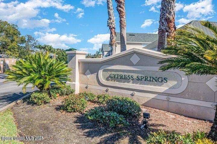 105 Turpial Way, Unit 105 Melbourne, FL 32901 - Photo 20 of 25 a view of a sign board with buildings in the background