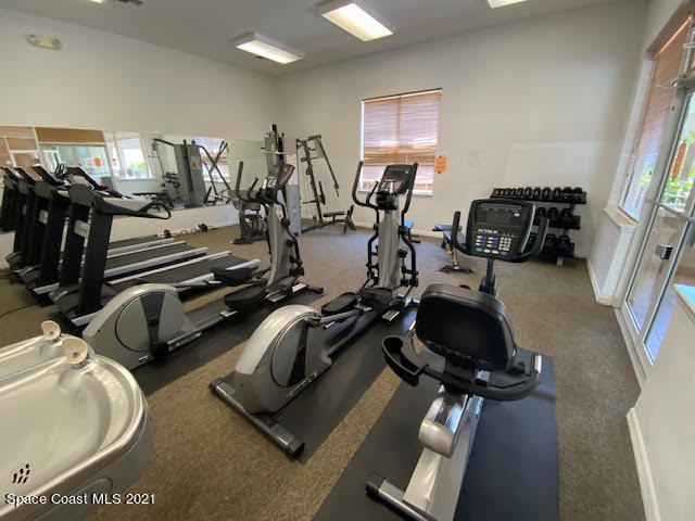 105 Turpial Way, Unit 105 Melbourne, FL 32901 - Photo 24 of 25 a view of a room with gym equipment