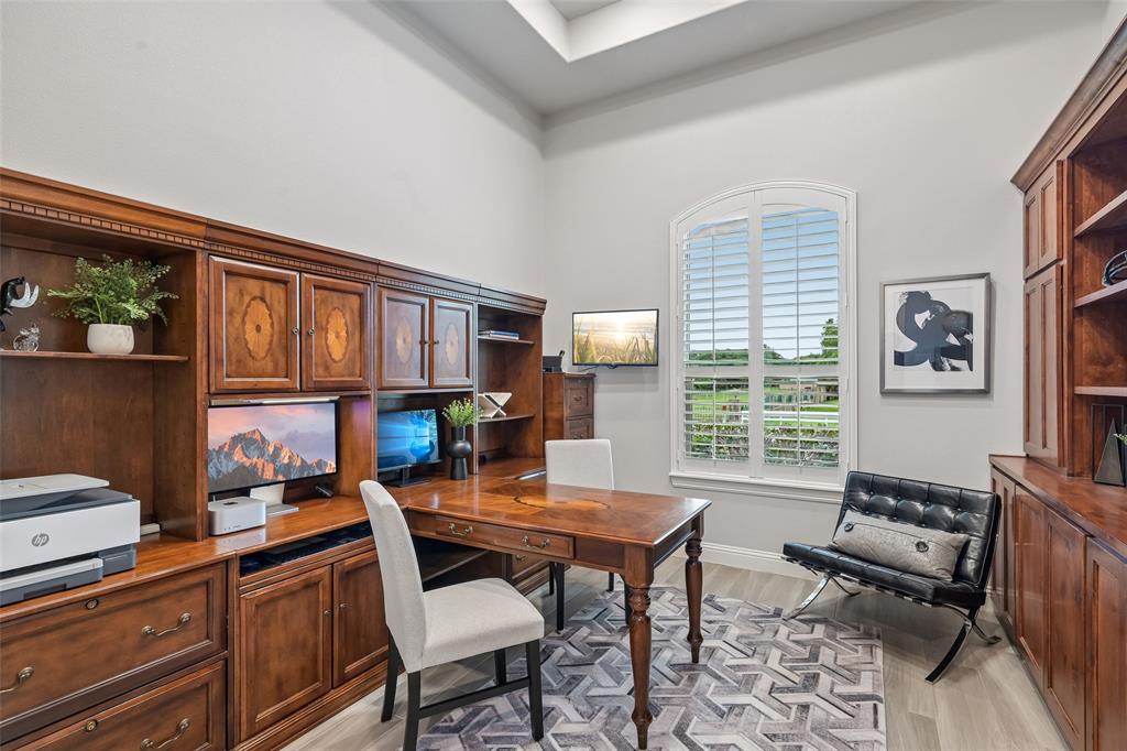 1657 Florence Road Keller, TX 76262 - Photo 7 of 40 a view of a workspace with furniture and a window