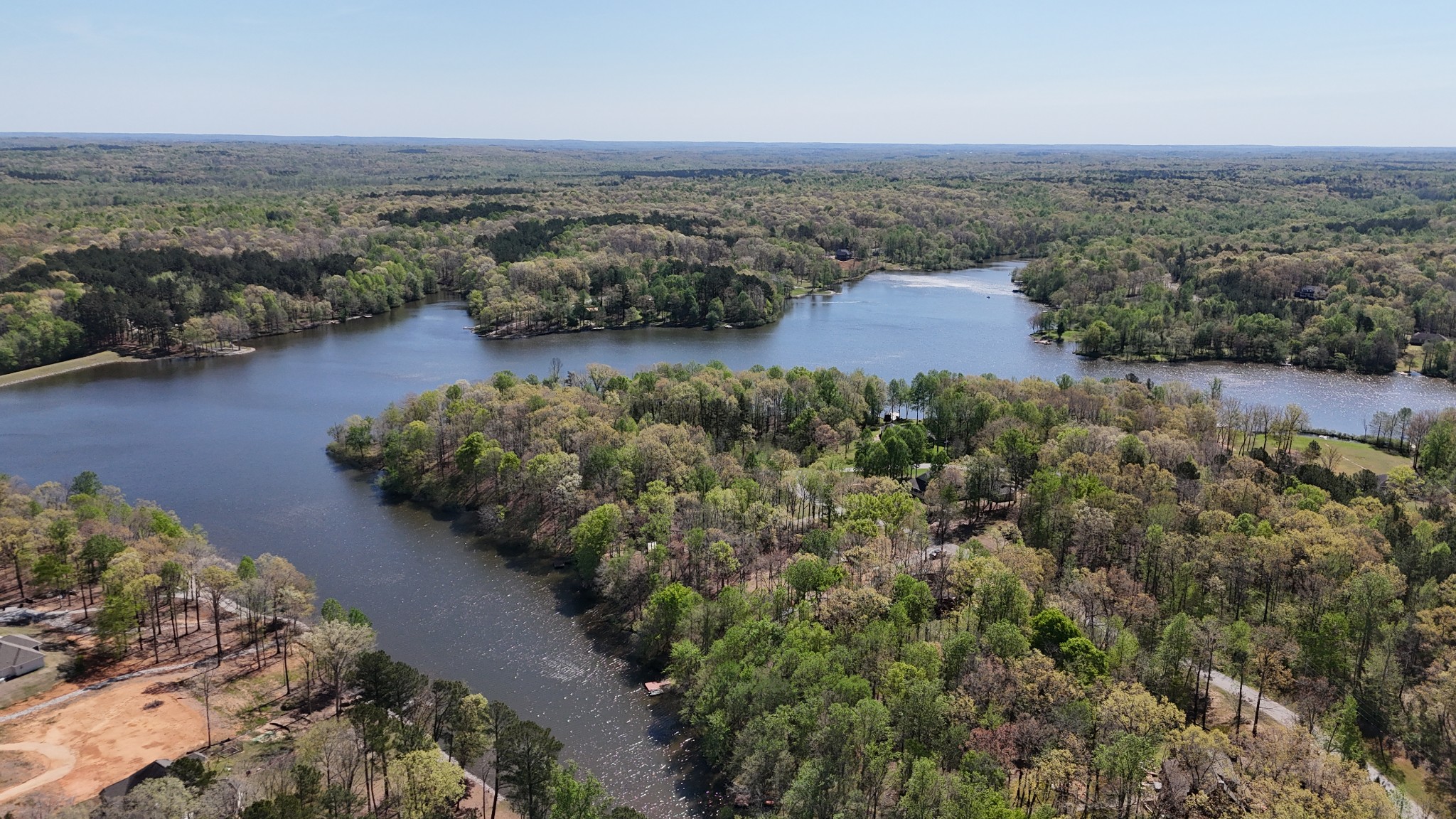 389 Excalibur Trail Cedar Grove, TN 38321 - Photo 5 of 5 an aerial view of a house with a yard and lake view