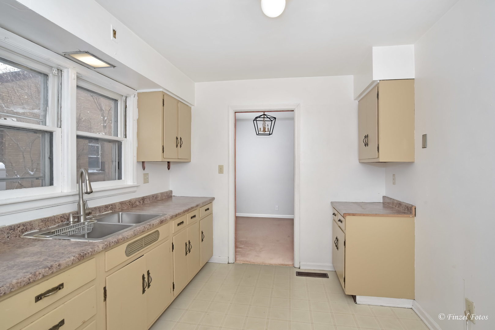 800 Morgan Street Elgin, IL 60123 - Photo 8 of 11 a bathroom with a granite countertop double vanity sink and mirror