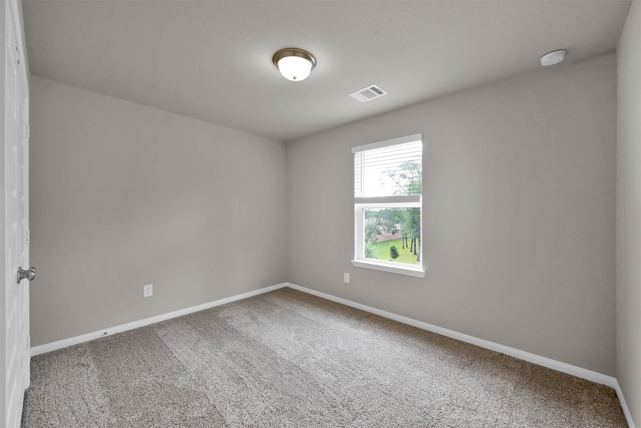 213 Harper Ridge Drive Montgomery, TX 77316 - Photo 25 of 34 an empty room with windows