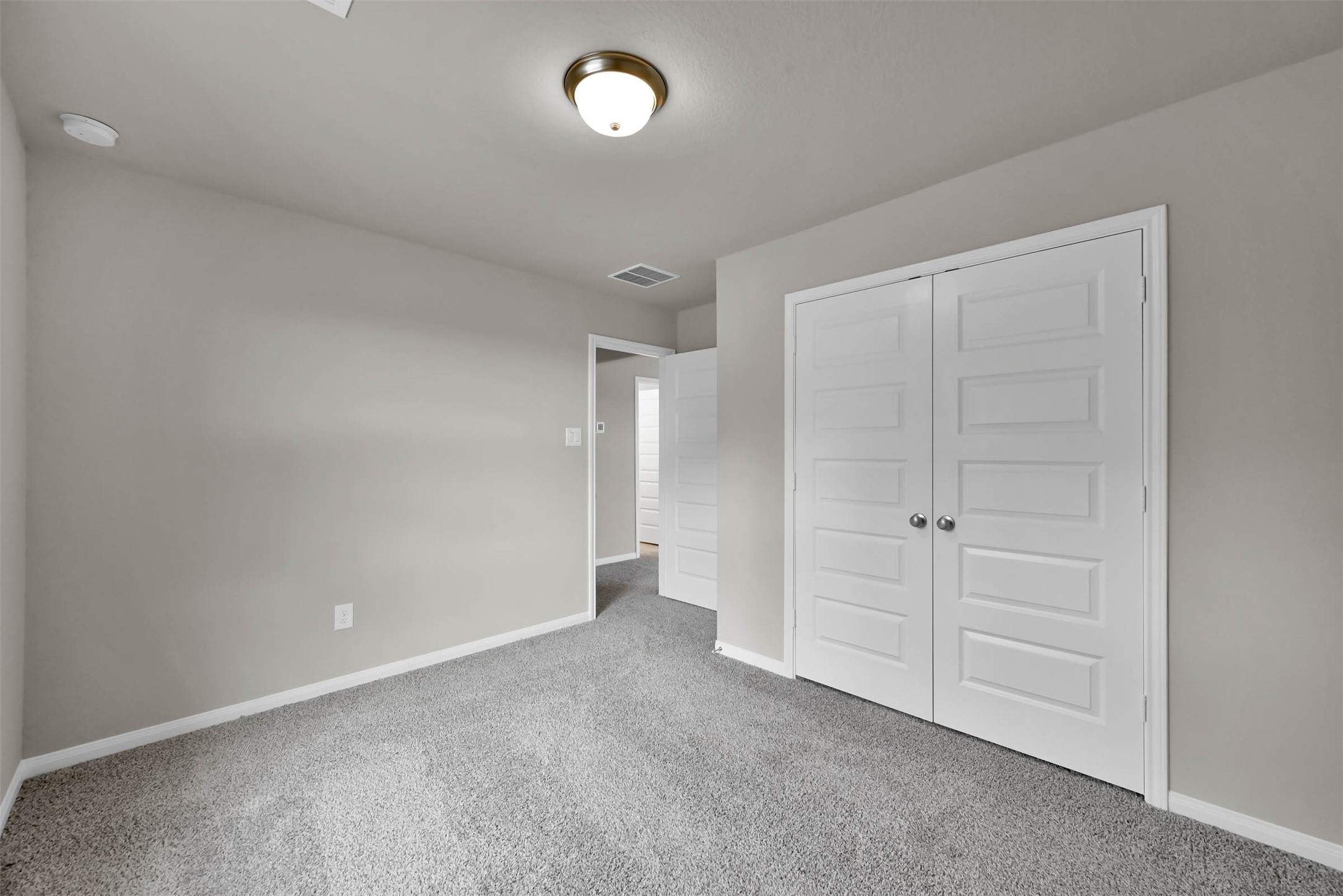 213 Harper Ridge Drive Montgomery, TX 77316 - Photo 26 of 34 an empty room with closet area