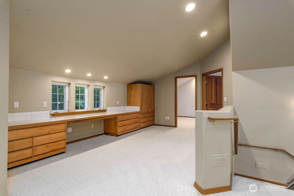 3250 Highway 302 Belfair, WA 98528 - Photo 17 of 40 a large white kitchen with a large window