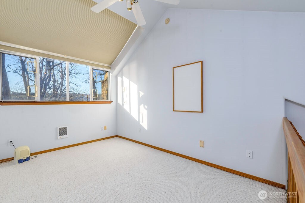 3250 Highway 302 Belfair, WA 98528 - Photo 28 of 40 an empty room with windows
