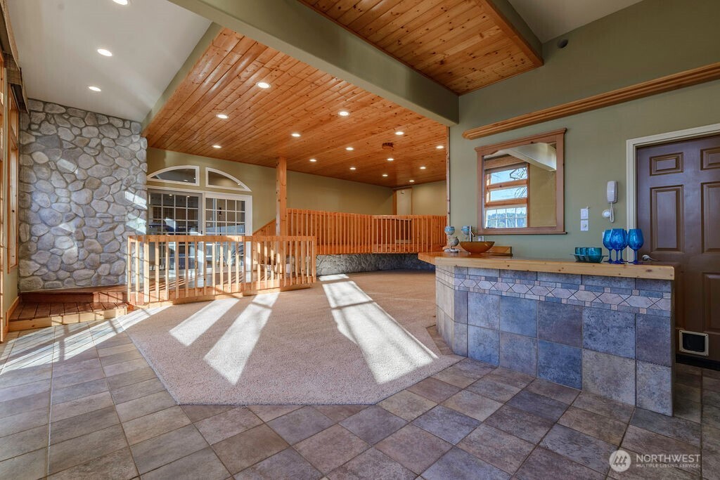 3250 Highway 302 Belfair, WA 98528 - Photo 31 of 40 a view of living room with granite countertop furniture and fireplace
