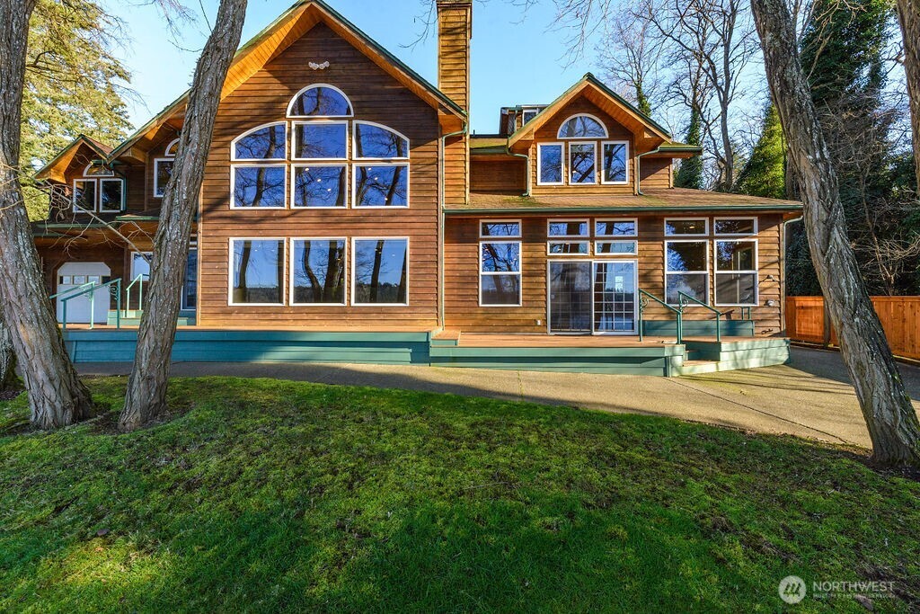 3250 Highway 302 Belfair, WA 98528 - Photo 35 of 40 a front view of a house with a yard