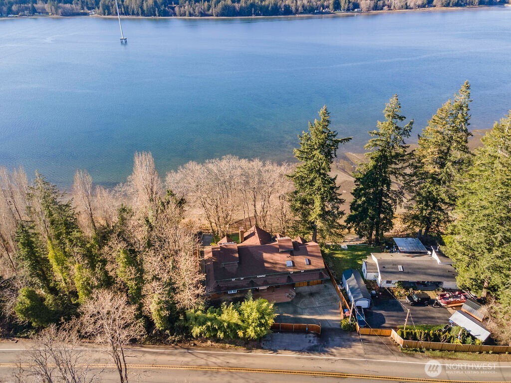 3250 Highway 302 Belfair, WA 98528 - Photo 39 of 40 a view of a house with a yard and sitting area