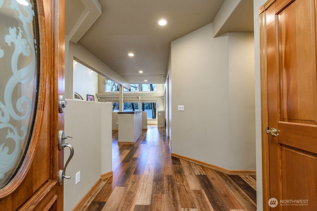3250 Highway 302 Belfair, WA 98528 - Photo 7 of 40 a view of entryway with wooden floor