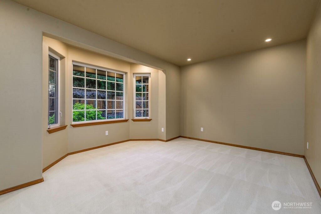 3250 Highway 302 Belfair, WA 98528 - Photo 8 of 40 a view of an empty room with a window