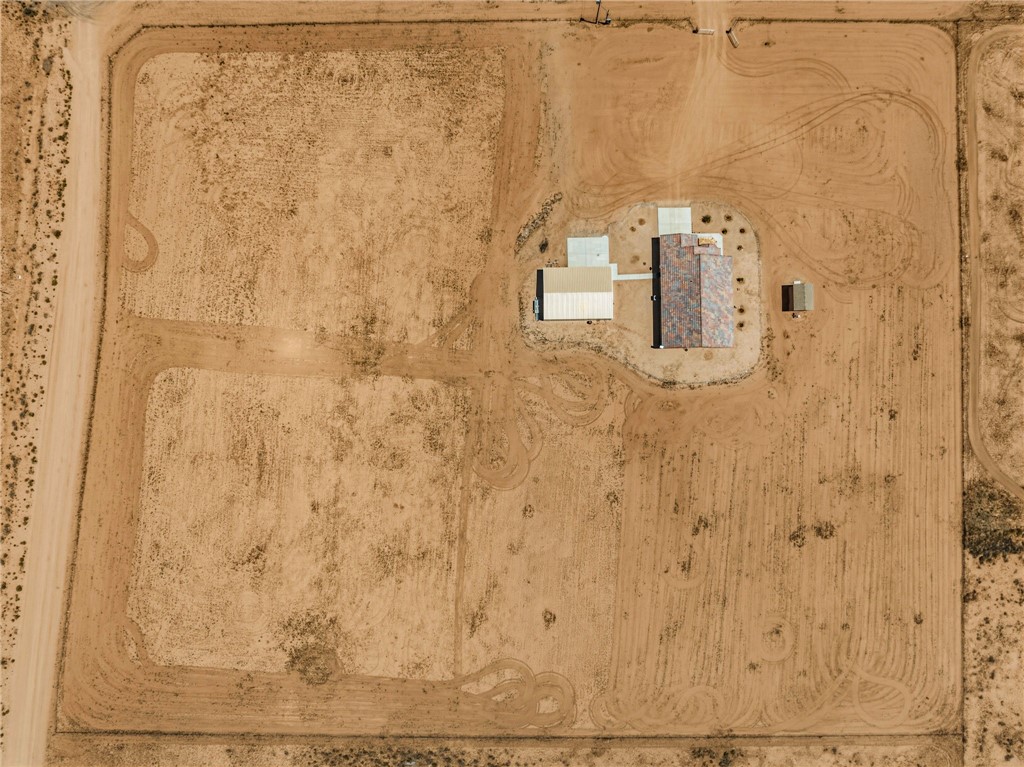 10809 North Jemez Road Kingman, AZ 86401 - Photo 50 of 51 Expansive desert property with a single-story residence featuring a multi-toned tile roof