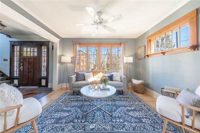 a living room with furniture and a table