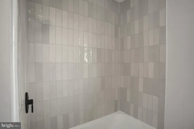 a bathroom with a shower curtain