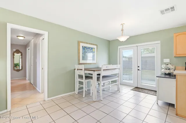 a dining room well furnished