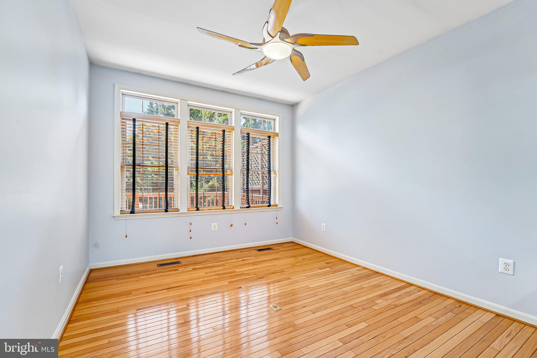 2422 Rippling Brook Road Frederick, MD 21701 - Photo 9 of 35 a view of an empty room with windows