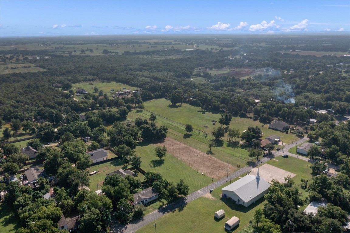 0 Q.S. Goins Lane Elgin, TX 78621 - Photo 2 of 12 an aerial view of residential houses with outdoor space