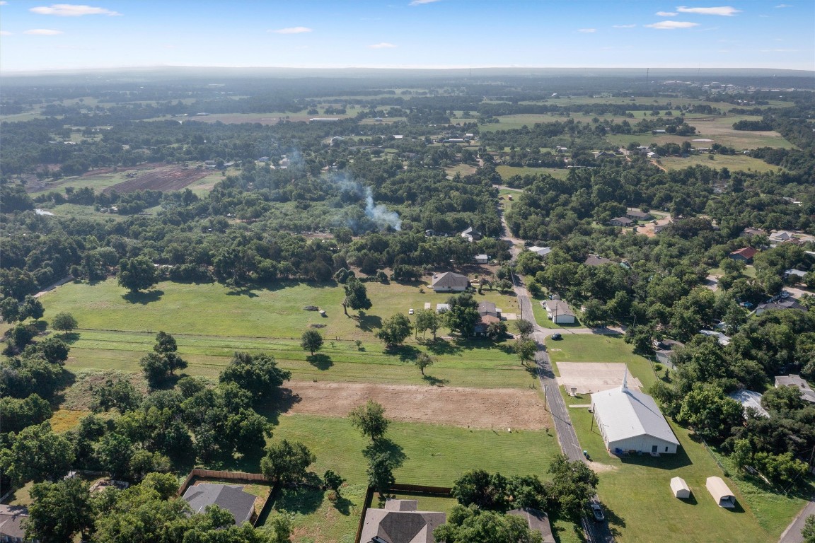 0 Q.S. Goins Lane Elgin, TX 78621 - Photo 3 of 12 an aerial view of residential houses with outdoor space and lake view