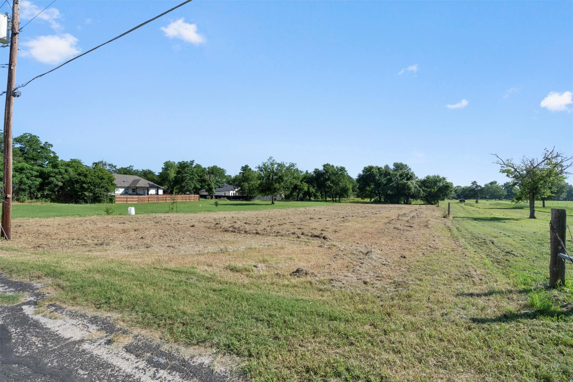 0 Q.S. Goins Lane Elgin, TX 78621 - Photo 5 of 12 a view of outdoor space with deck and yard