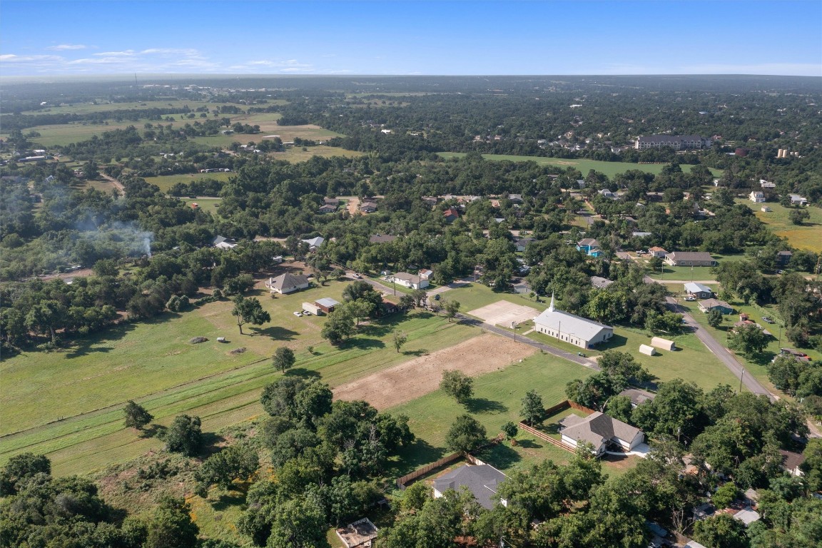 0 Q.S. Goins Lane Elgin, TX 78621 - Photo 8 of 12 an aerial view of residential houses with outdoor space