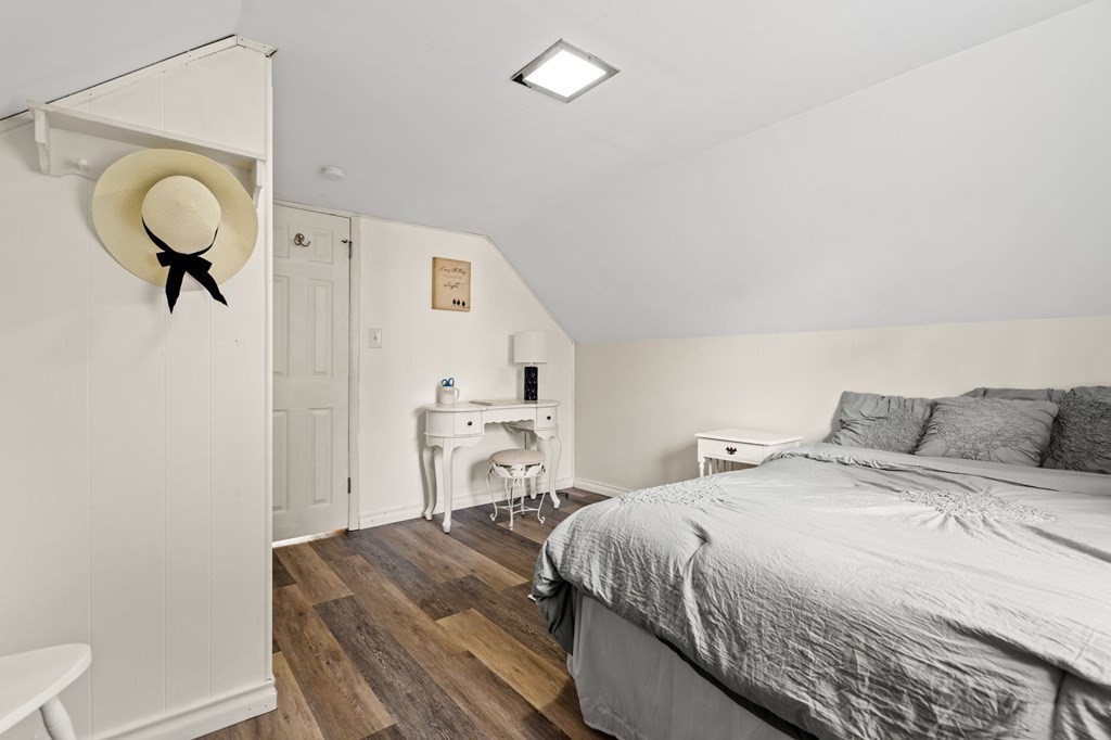 61 Colasanti Road Weymouth, MA 02191 - Photo 21 of 37 a bedroom with a bed and a mirror