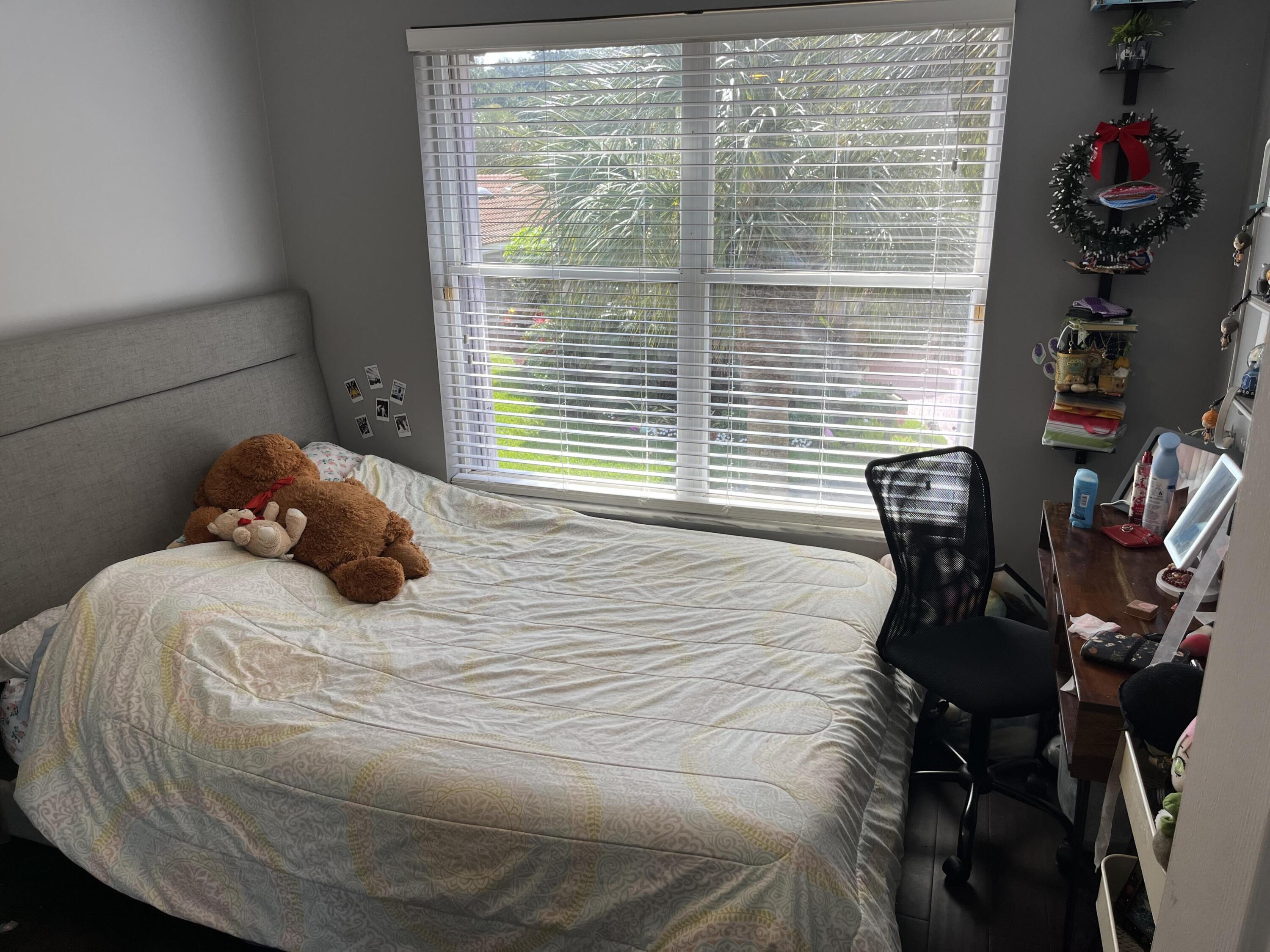 17651 Tiffany Trace Drive Boca Raton, FL 33487 - Photo 13 of 17 a bedroom with a bed and a window