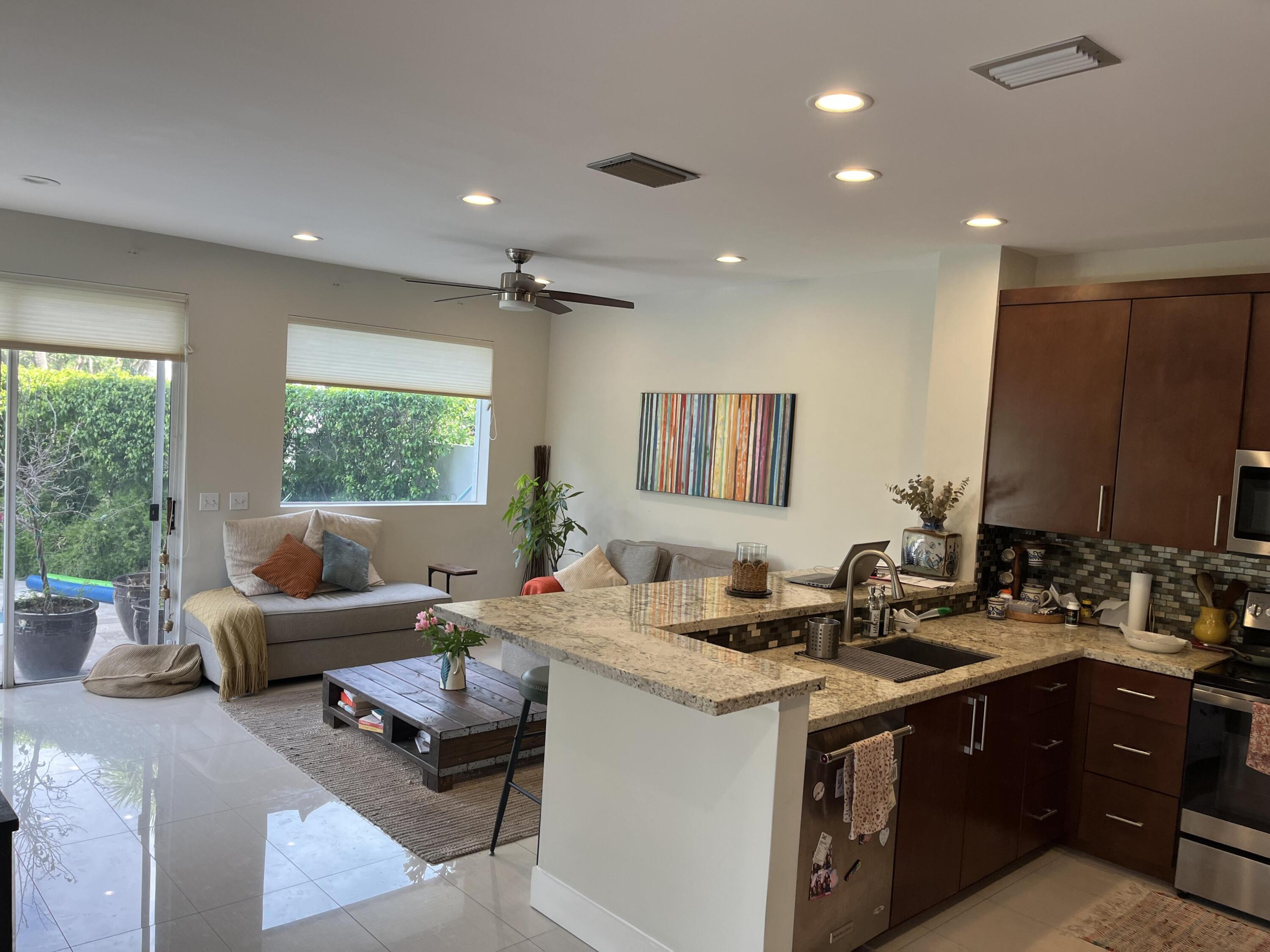 17651 Tiffany Trace Drive Boca Raton, FL 33487 - Photo 6 of 17 a living room with furniture and a window