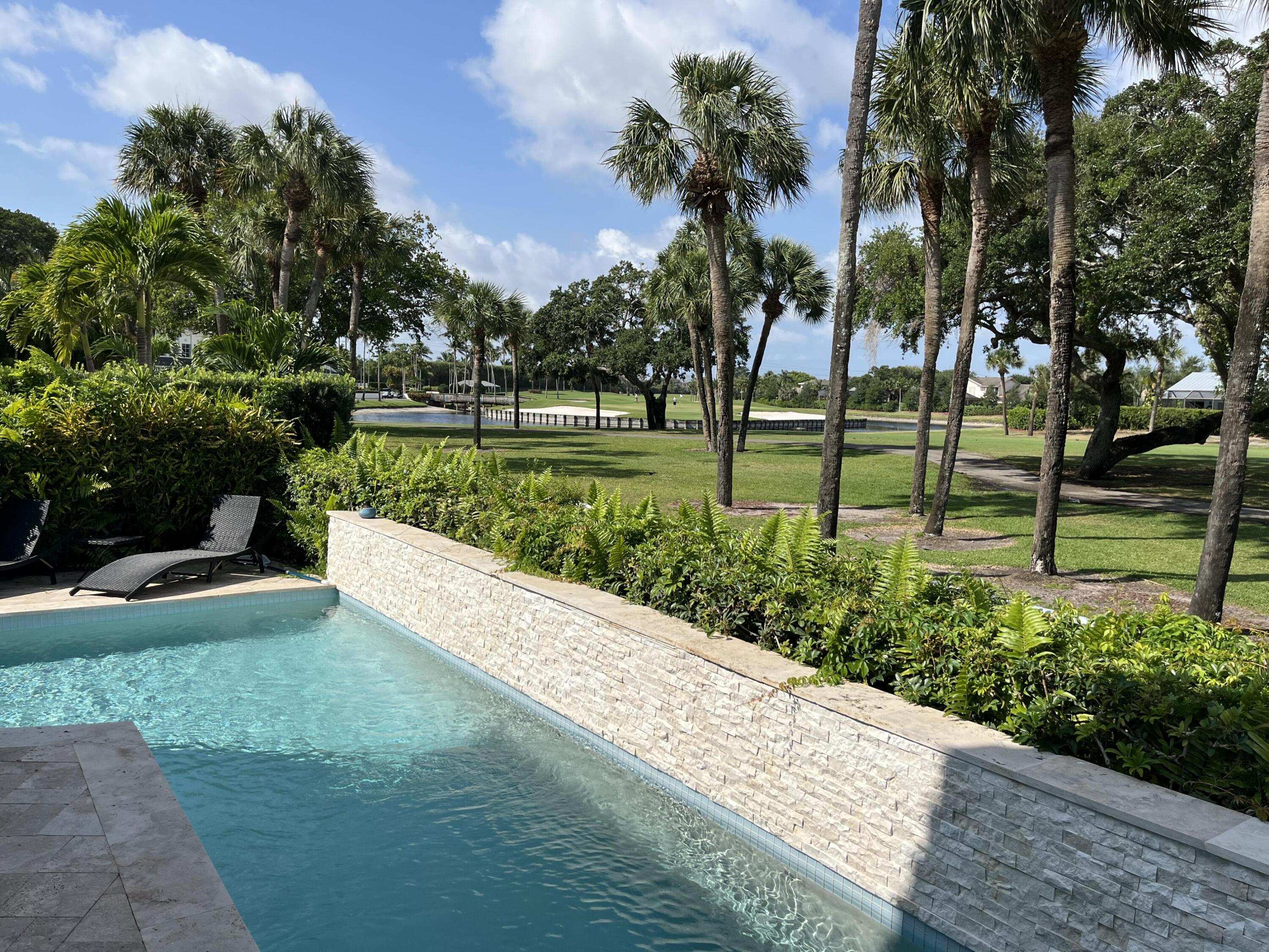 17651 Tiffany Trace Drive Boca Raton, FL 33487 - Photo 7 of 17 a view of a park with large trees