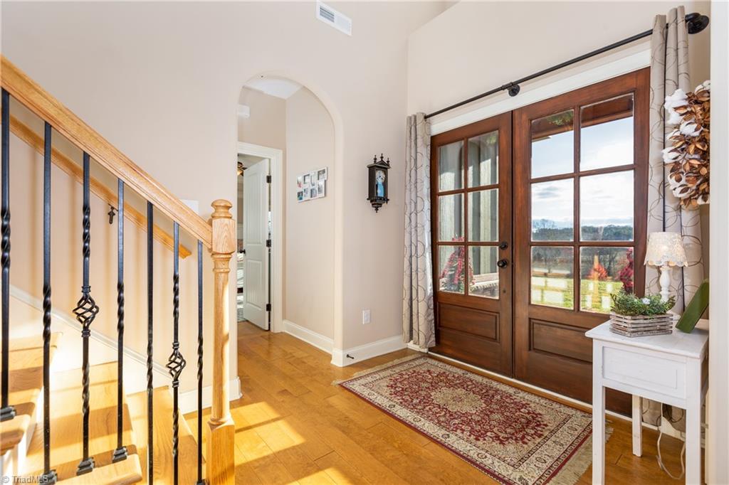 105 Mountain Ridge Court King, NC 27021 - Photo 12 of 43 Double entry doors welcome you to the double height foyer