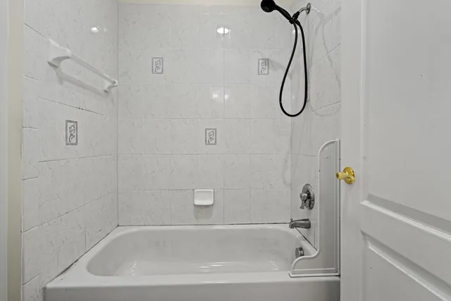 a view of a kitchen with electric appliances