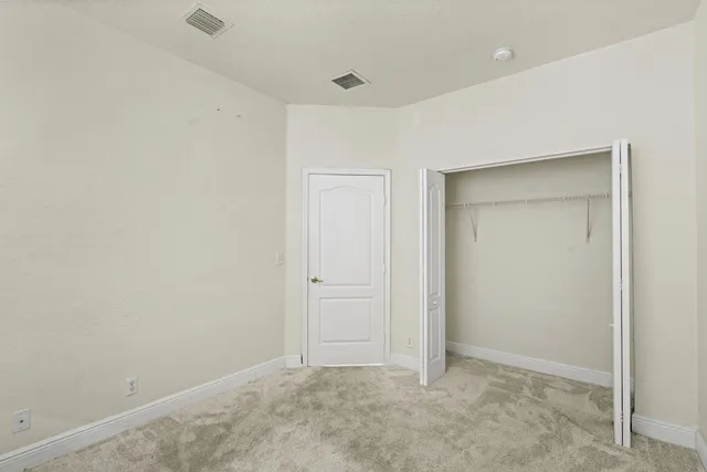 an empty room with closet