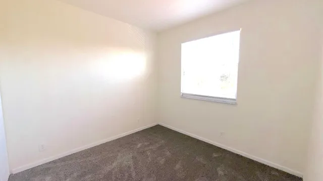 an empty room with a window