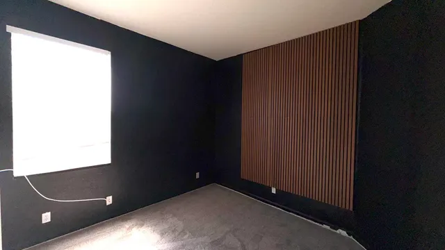 a view of a hallway with stairs