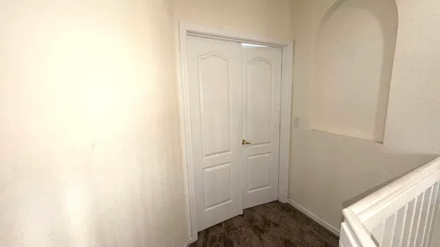 a view of small space with racks on the wall