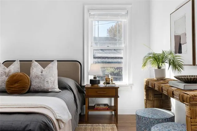 a bathroom with a toilet a sink and a mirror