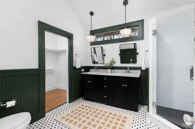 a bathroom with a sink and mirror