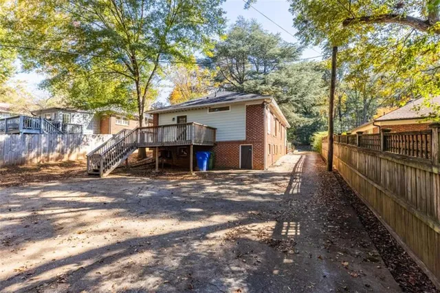 a aerial view of a house with a yard