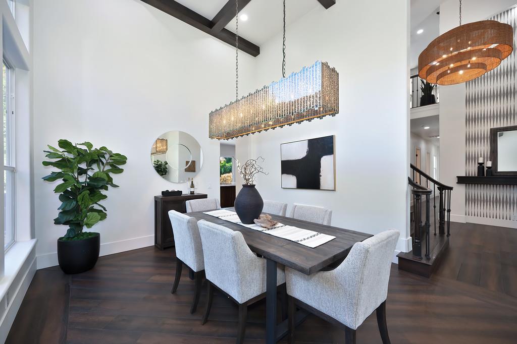 9042 Cedar Ridge Drive Granite Bay, CA 95746 - Photo 14 of 96 a view of a dining room with furniture and wooden floor