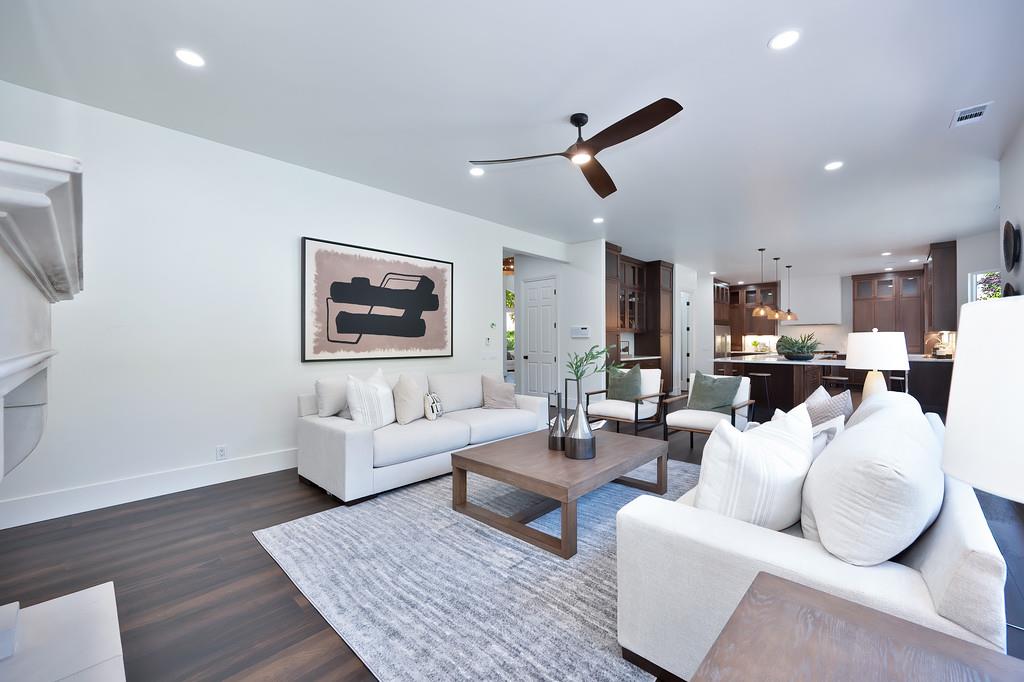 9042 Cedar Ridge Drive Granite Bay, CA 95746 - Photo 23 of 96 a living room with furniture kitchen view and a wooden floor
