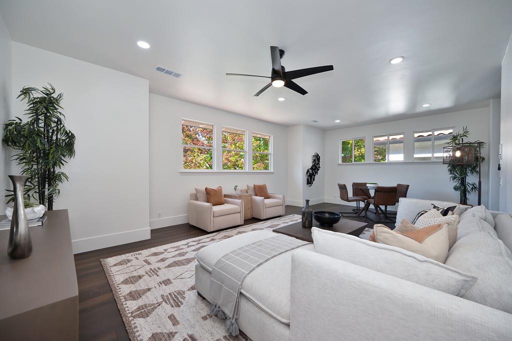 9042 Cedar Ridge Drive Granite Bay, CA 95746 - Photo 62 of 96 a living room with furniture and a potted plant