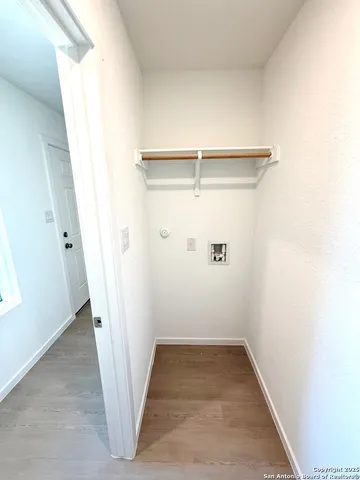 a bedroom with 2 bed and a couch